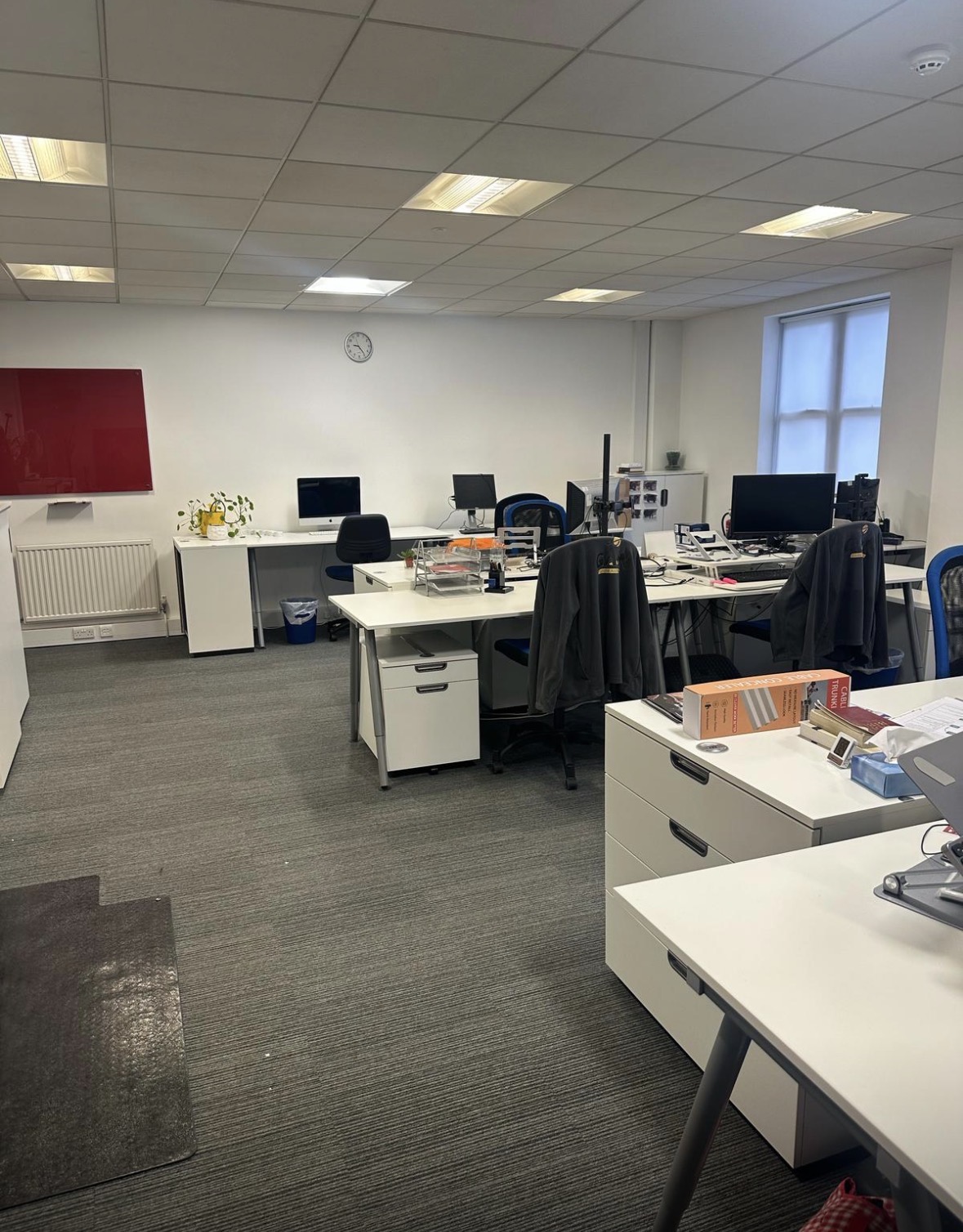 Open-plan office requiring water-damage assessment and drying planning.