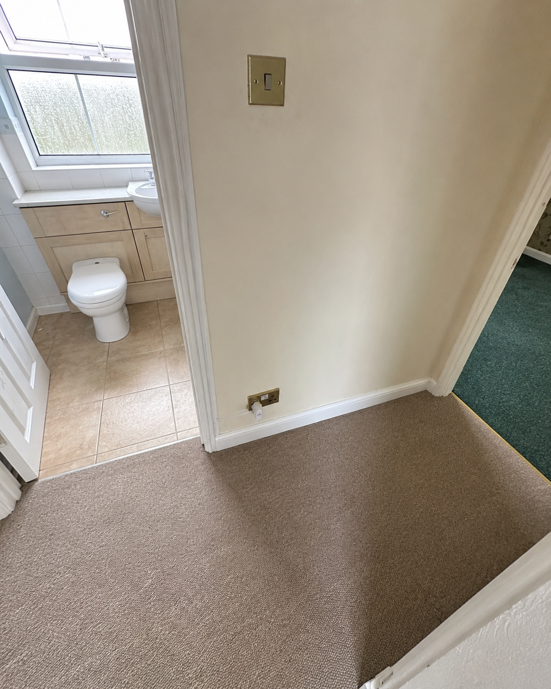 Completed landing area with repaired ceiling and clean decoration