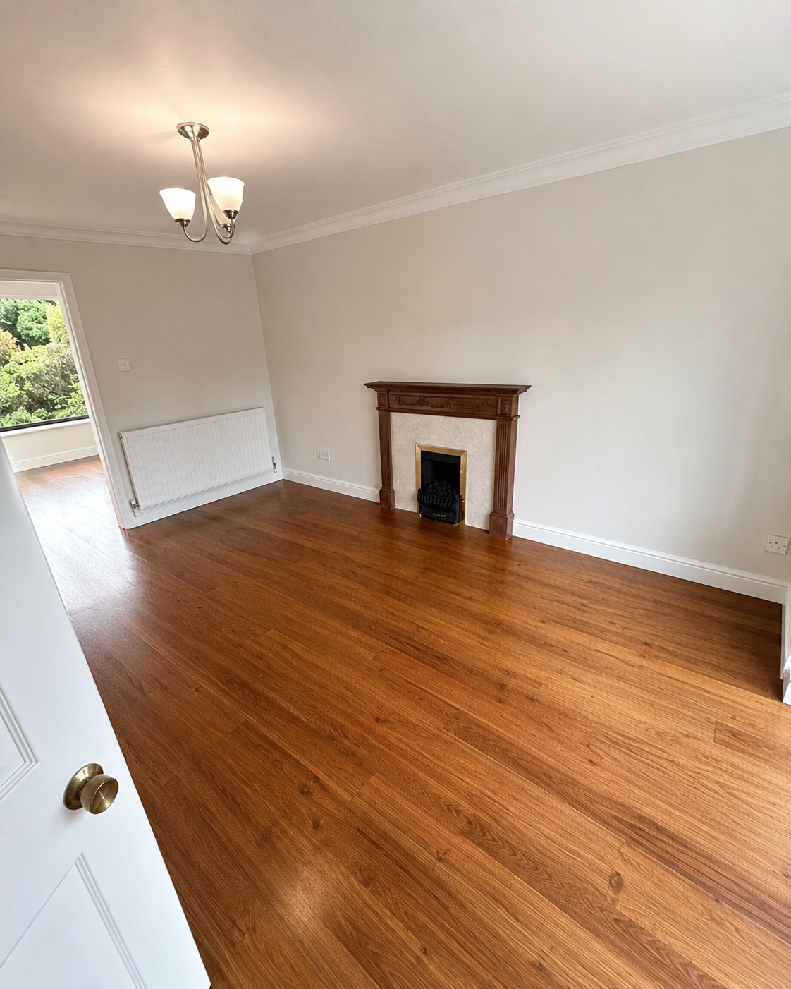 Completed living room with repaired ceiling and finished decoration