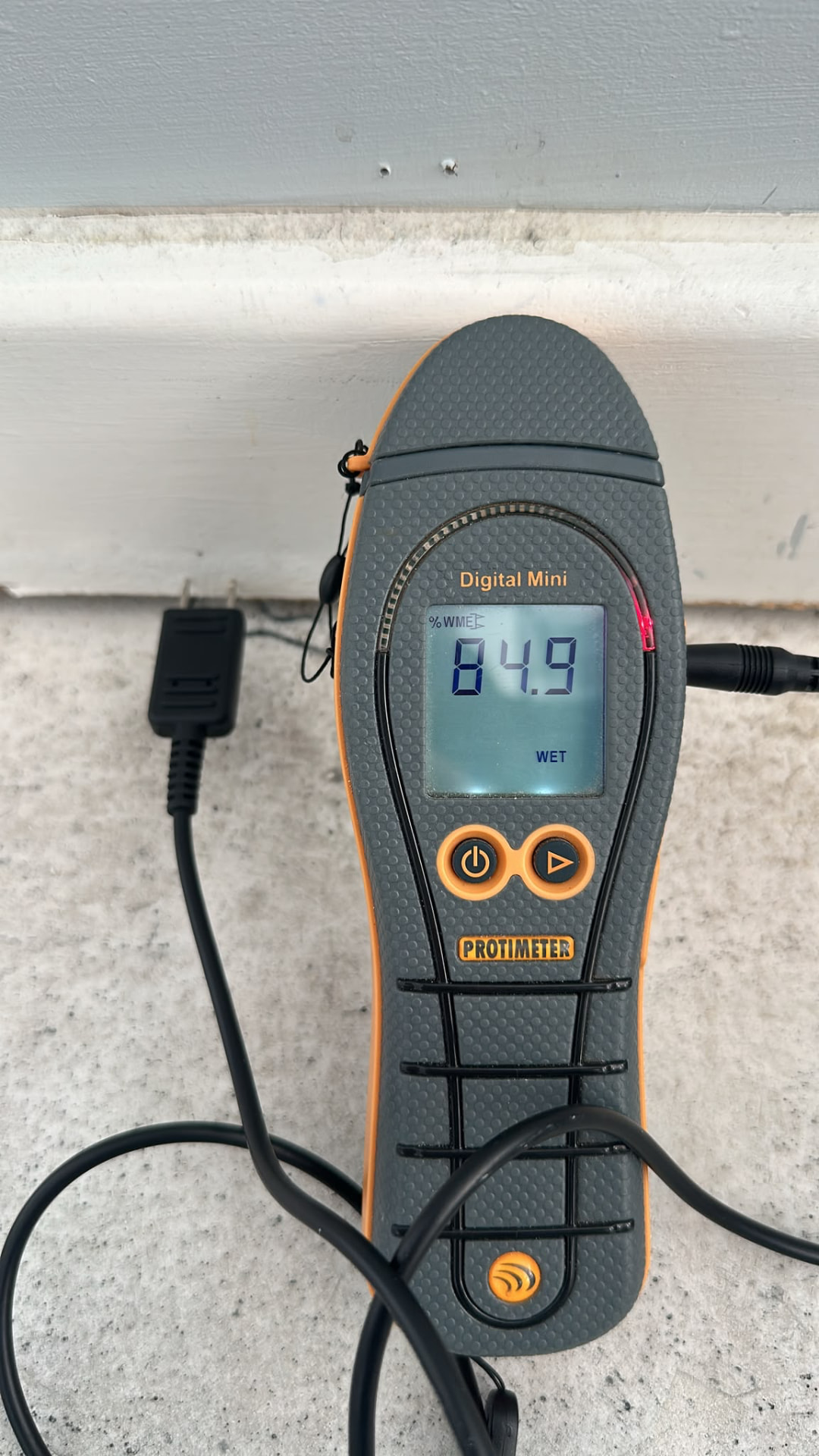Protimeter Digital Mini moisture meter reading recorded during later monitoring on the affected wall base